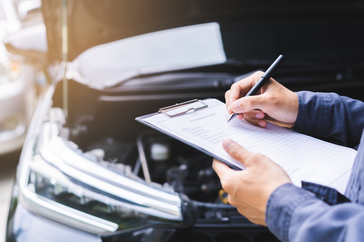 Mechanic with checklist