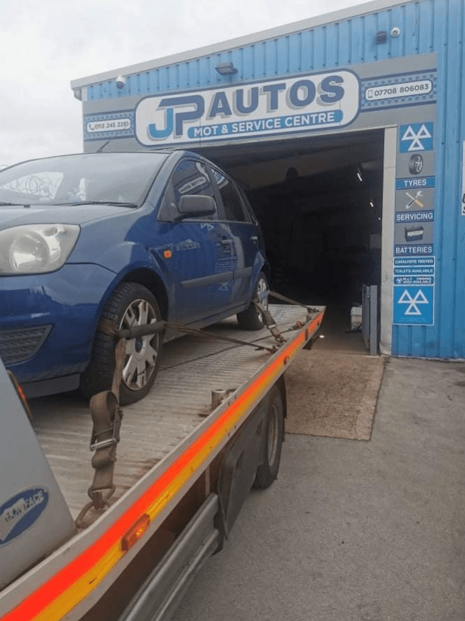 Mechanic working on a car