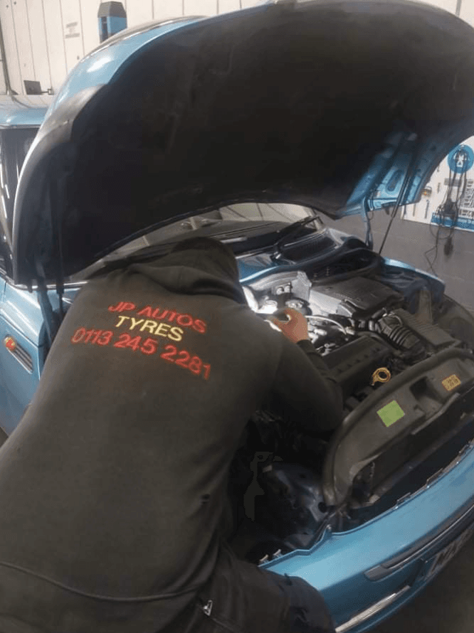Mechanic working on a car