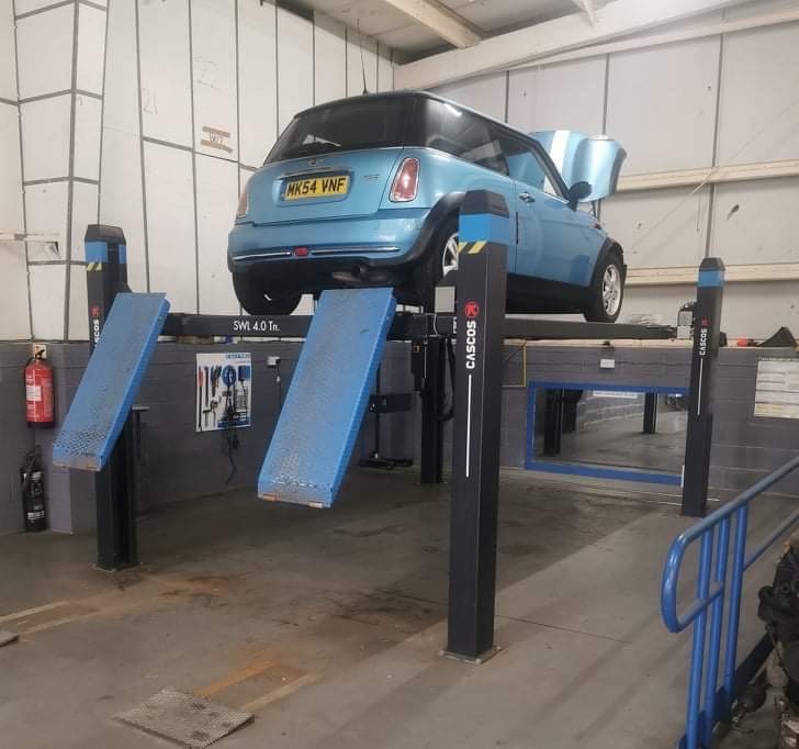 Car on a ramp in the workshop